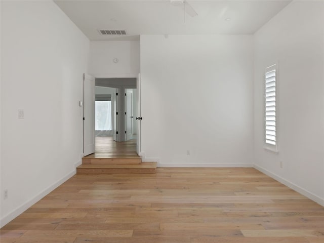 4105 Mcbrine Pl, Austin, TX 78746 - spare room featuring ceiling fan, plenty of natural light, and light wood-style floors