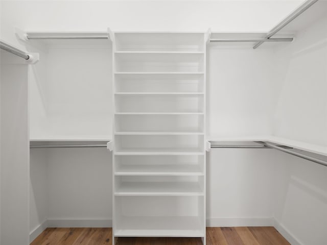 4105 Mcbrine Pl, Austin, TX 78746 - walk in closet featuring wood finished floors