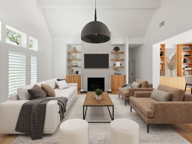 4105 Mcbrine Pl, Austin, TX 78746 - living room featuring high vaulted ceiling, light wood finished floors, built in shelves, a fireplace, and beam ceiling
