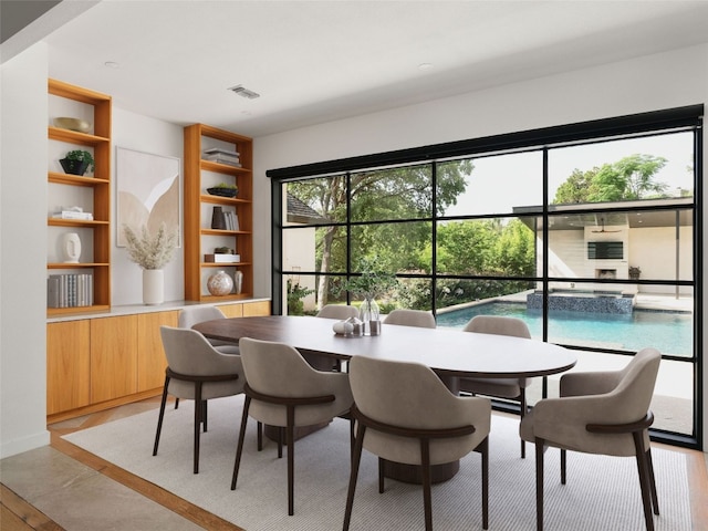 4105 Mcbrine Pl, Austin, TX 78746 - dining space featuring built in shelves