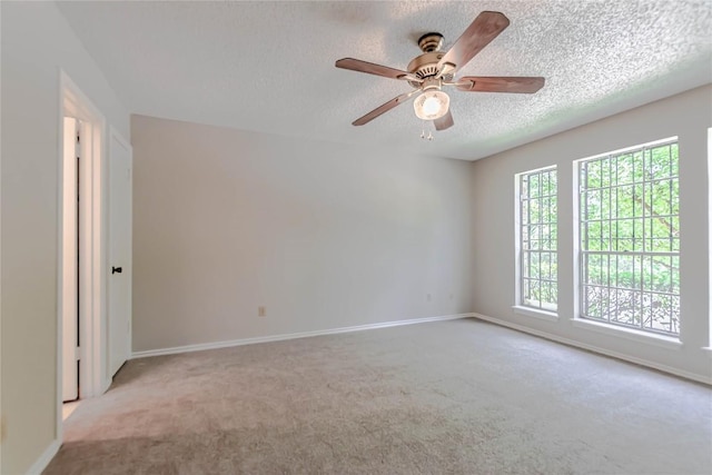 2008 Sandberg Dr, Austin, TX 78752 - carpeted spare room featuring a textured ceiling and ceiling fan