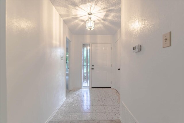 2008 Sandberg Dr, Austin, TX 78752 - foyer entrance with a textured ceiling