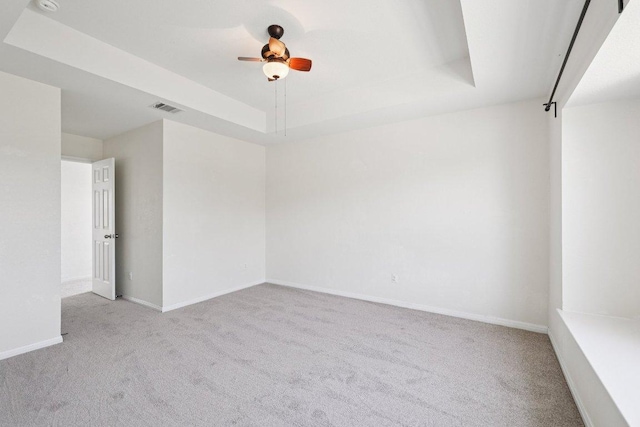 1900 Little Elm Trl Unit 98, Cedar Park, TX 78613 - unfurnished room featuring carpet flooring, a raised ceiling, and ceiling fan