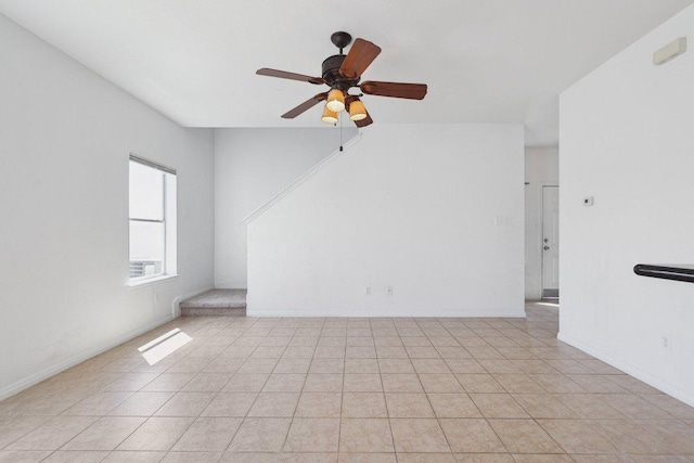 1900 Little Elm Trl Unit 98, Cedar Park, TX 78613 - empty room featuring a ceiling fan and light tile patterned flooring