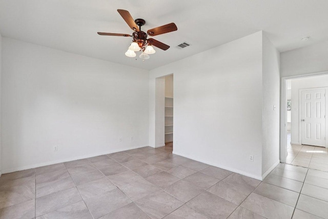 1900 Little Elm Trl Unit 98, Cedar Park, TX 78613 - empty room with a ceiling fan and light tile patterned floors