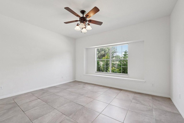 1900 Little Elm Trl Unit 98, Cedar Park, TX 78613 - spare room featuring light tile patterned flooring and a ceiling fan