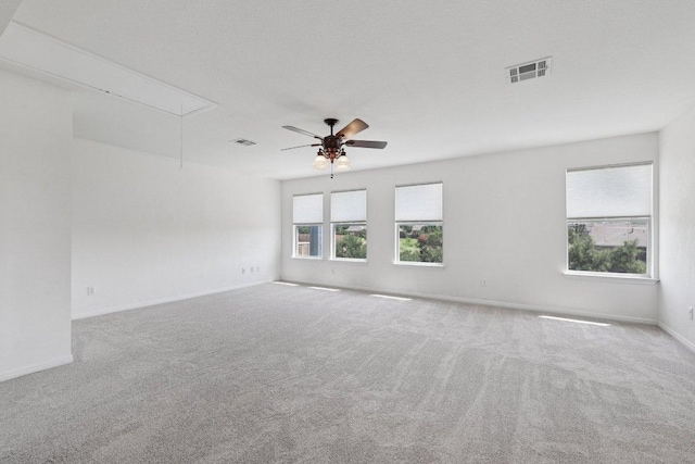 1900 Little Elm Trl Unit 98, Cedar Park, TX 78613 - carpeted spare room with attic access and ceiling fan