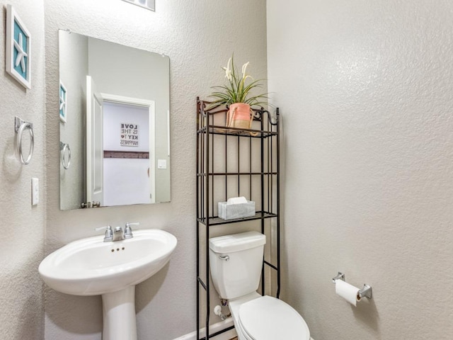 1329 Nokota Bnd, Georgetown, TX 78626 - half bath with a textured wall