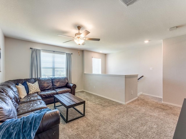 1329 Nokota Bnd, Georgetown, TX 78626 - carpeted living area with ceiling fan and baseboards