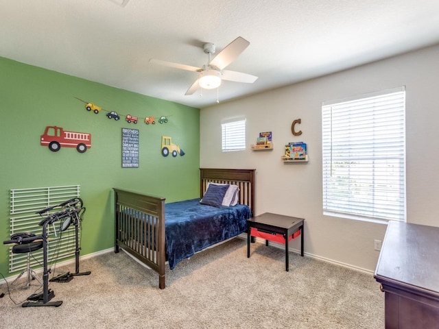 1329 Nokota Bnd, Georgetown, TX 78626 - bedroom with carpet flooring and a ceiling fan