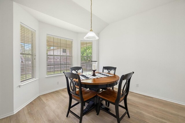 1643 Abbey Ln, Cedar Park, TX 78613 - dining room featuring light wood finished floors and vaulted ceiling