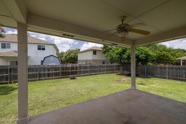 1643 Abbey Ln, Cedar Park, TX 78613 - fenced backyard featuring a ceiling fan and a patio area