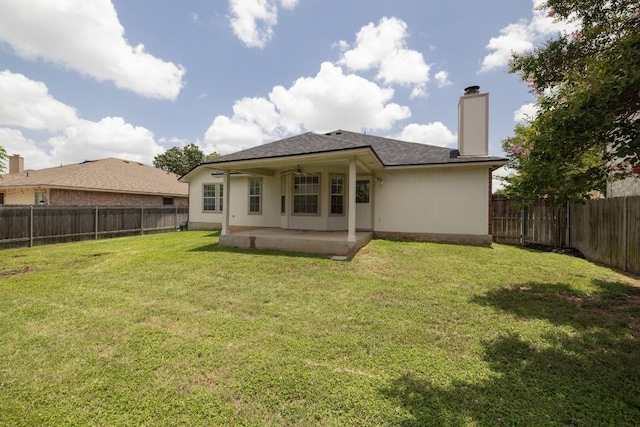 1643 Abbey Ln, Cedar Park, TX 78613 - rear view of house with a patio, a fenced backyard, ceiling fan, and a chimney