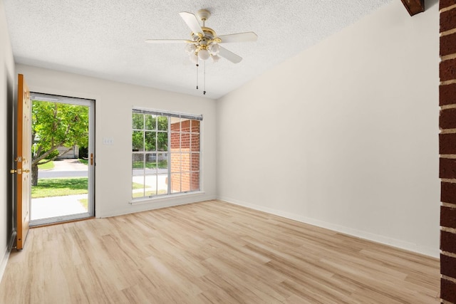 6804 Miranda Dr, Austin, TX 78752 - empty room featuring wood finished floors, a textured ceiling, and ceiling fan