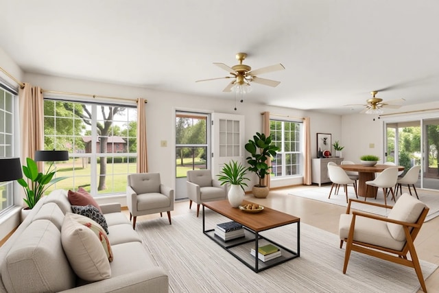6804 Miranda Dr, Austin, TX 78752 - living area featuring a ceiling fan and light wood-style floors