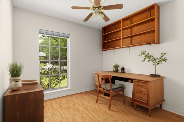 6804 Miranda Dr, Austin, TX 78752 - home office with light wood-style flooring and ceiling fan