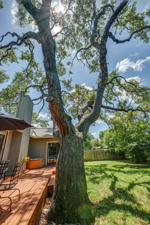 5808 Abilene Trl, Austin, TX 78749 - view of yard with a deck