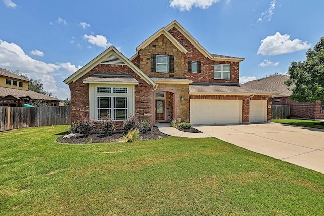 318 Gaspar Bnd, Cedar Park, TX 78613 - traditional-style home with driveway, brick siding, stone siding, and an attached garage