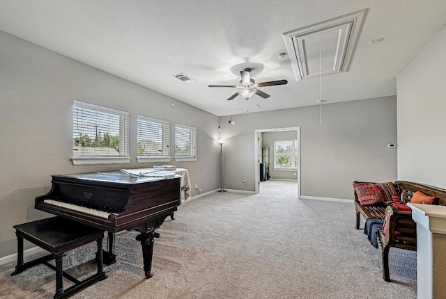 318 Gaspar Bnd, Cedar Park, TX 78613 - living area with attic access, light colored carpet, and a ceiling fan