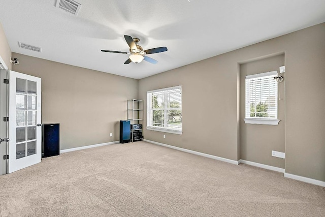 318 Gaspar Bnd, Cedar Park, TX 78613 - spare room featuring carpet and a ceiling fan