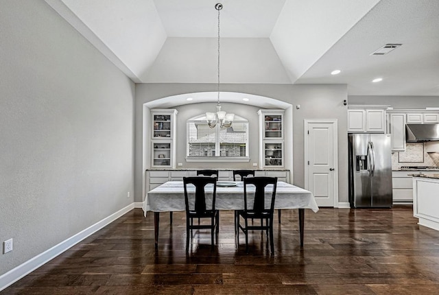 318 Gaspar Bnd, Cedar Park, TX 78613 - dining room with a chandelier, vaulted ceiling, dark wood-type flooring, and recessed lighting