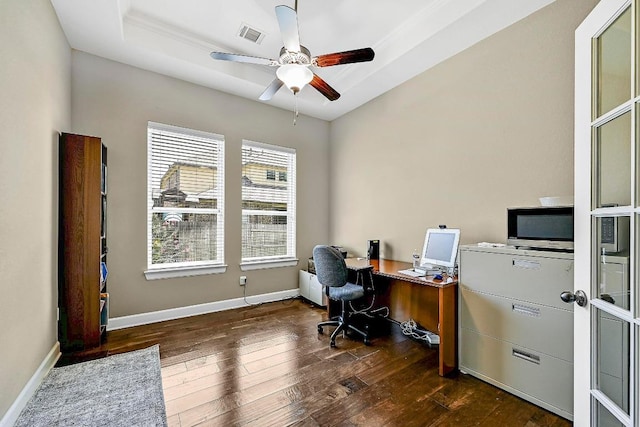 318 Gaspar Bnd, Cedar Park, TX 78613 - home office featuring dark wood-type flooring, ceiling fan, and a tray ceiling