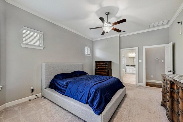318 Gaspar Bnd, Cedar Park, TX 78613 - bedroom with light carpet, ornamental molding, multiple windows, and ensuite bath
