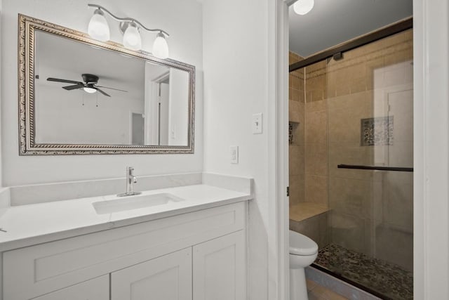 2109 Brandywine Ln, Austin, TX 78727 - bathroom featuring a stall shower, vanity, and ceiling fan