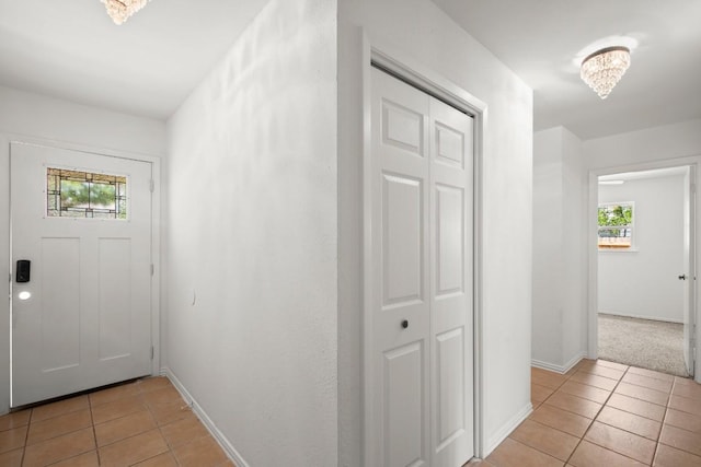 2109 Brandywine Ln, Austin, TX 78727 - entrance foyer featuring light tile patterned flooring and healthy amount of natural light