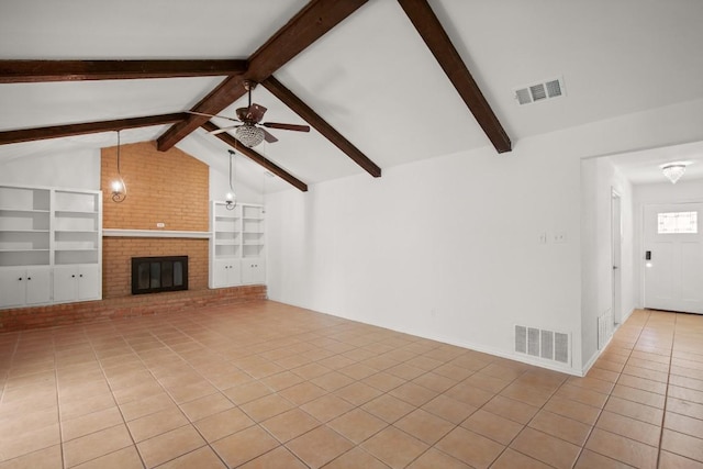 2109 Brandywine Ln, Austin, TX 78727 - unfurnished living room featuring built in features, light tile patterned floors, a ceiling fan, and a brick fireplace