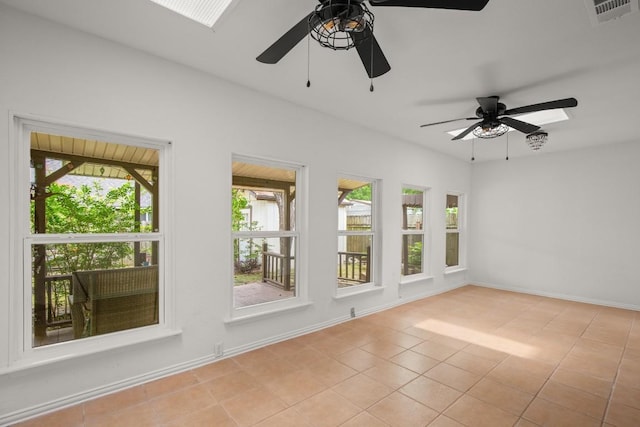 2109 Brandywine Ln, Austin, TX 78727 - spare room featuring ceiling fan, plenty of natural light, and light tile patterned flooring