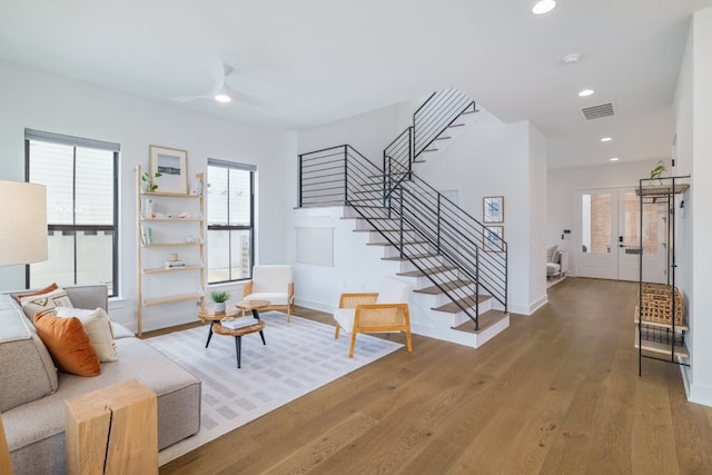 3108 Chennault St, Austin, TX 78723 - living area with stairway, wood finished floors, recessed lighting, and a ceiling fan