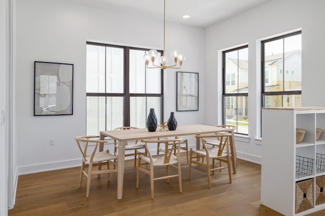 3108 Chennault St, Austin, TX 78723 - dining area featuring wood finished floors, a chandelier, and recessed lighting