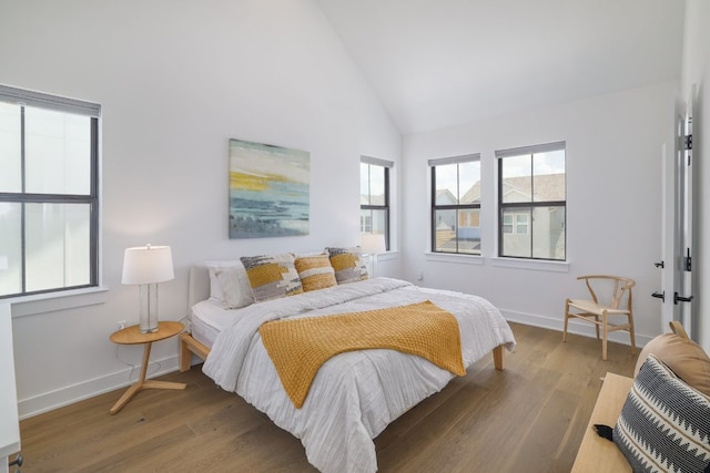 3108 Chennault St, Austin, TX 78723 - bedroom with wood finished floors and high vaulted ceiling