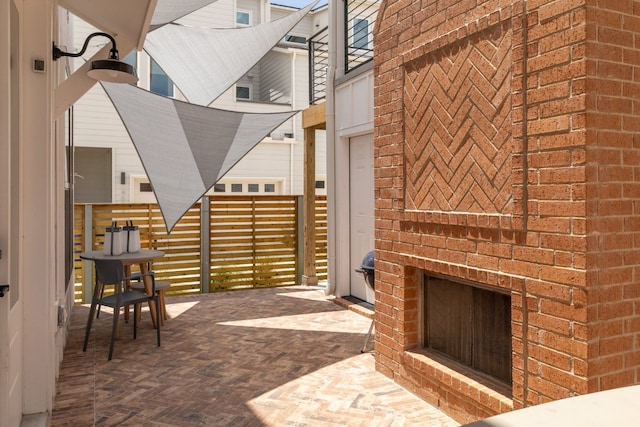 3108 Chennault St, Austin, TX 78723 - view of patio with a fireplace