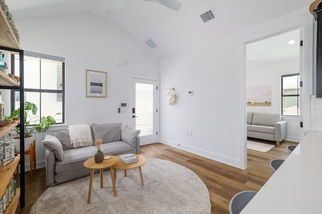 3108 Chennault St, Austin, TX 78723 - living room with vaulted ceiling, wood finished floors, and ceiling fan