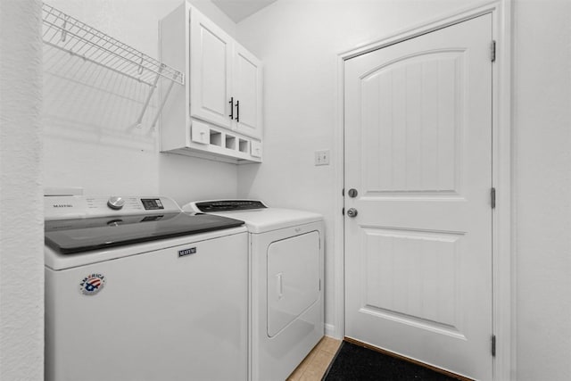 11400 W Parmer Ln Unit 44, Cedar Park, TX 78613 - laundry room with independent washer and dryer, cabinet space, and light tile patterned floors