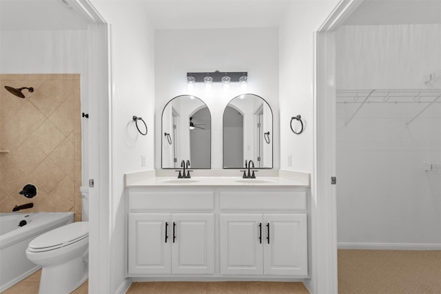 11400 W Parmer Ln Unit 44, Cedar Park, TX 78613 - bathroom with double vanity, shower / bath combination, ceiling fan, and a spacious closet