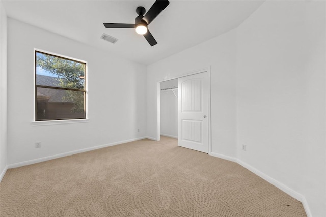 11400 W Parmer Ln Unit 44, Cedar Park, TX 78613 - unfurnished bedroom with light colored carpet, a closet, and a ceiling fan