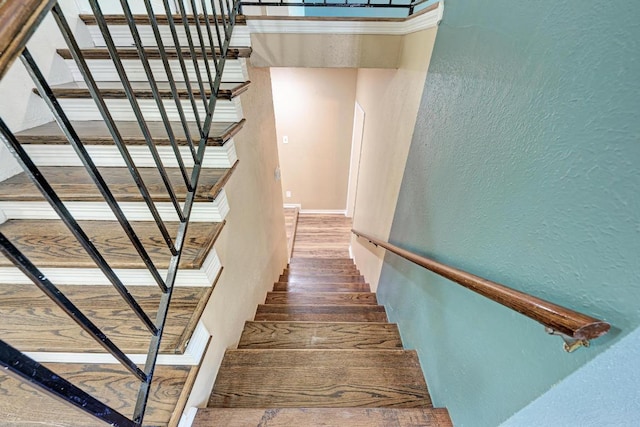 2505 Linwood Rd, Temple, TX 76502 - stairway with a textured wall and wood finished floors