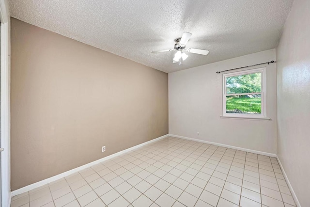2505 Linwood Rd, Temple, TX 76502 - spare room with a textured ceiling, ceiling fan, and light tile patterned flooring