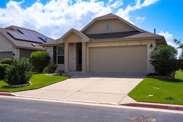13903 Cantata Ln, Austin, TX 78660 - single story home with driveway, a shingled roof, stone siding, an attached garage, and a front yard