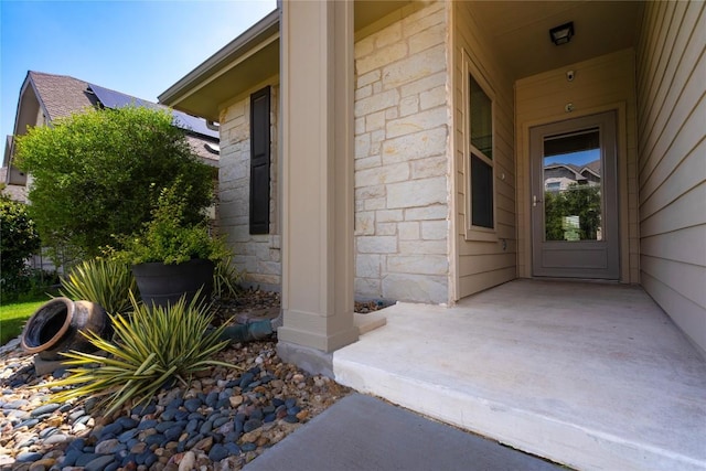 13903 Cantata Ln, Austin, TX 78660 - view of exterior entry featuring stone siding