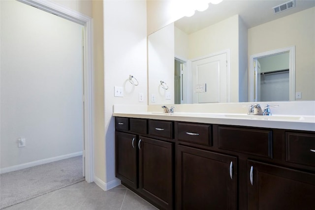 13903 Cantata Ln, Austin, TX 78660 - full bath with double vanity and tile patterned flooring