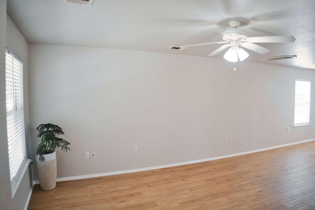 12805 Briarcreek Loop, Manor, TX 78653 - empty room featuring light wood-style floors and ceiling fan