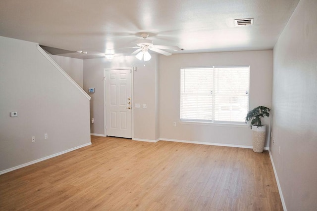 12805 Briarcreek Loop, Manor, TX 78653 - entryway with ceiling fan, light wood-style flooring, and stairs