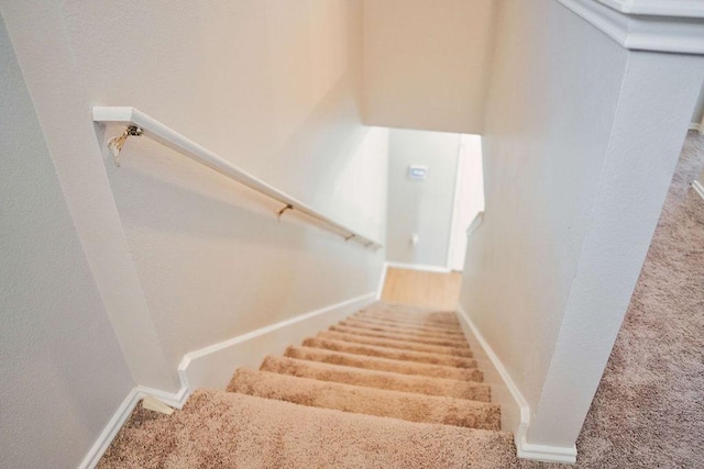 12805 Briarcreek Loop, Manor, TX 78653 - staircase featuring carpet flooring and baseboards