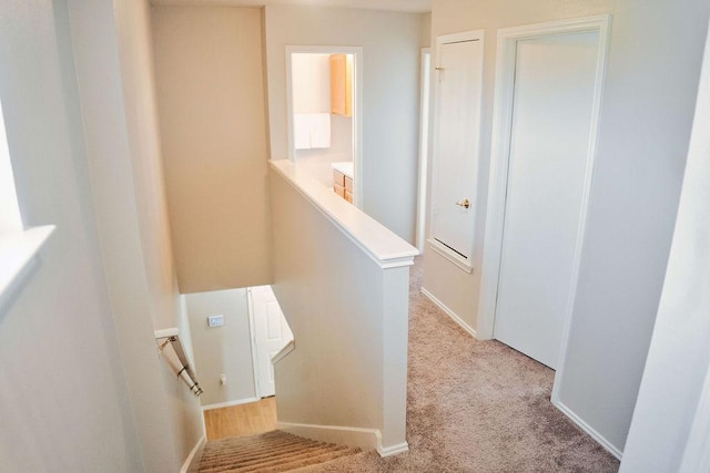 12805 Briarcreek Loop, Manor, TX 78653 - staircase featuring carpet floors and baseboards