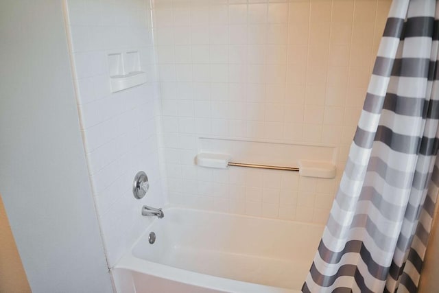 12805 Briarcreek Loop, Manor, TX 78653 - bathroom featuring shower / bath combo with shower curtain