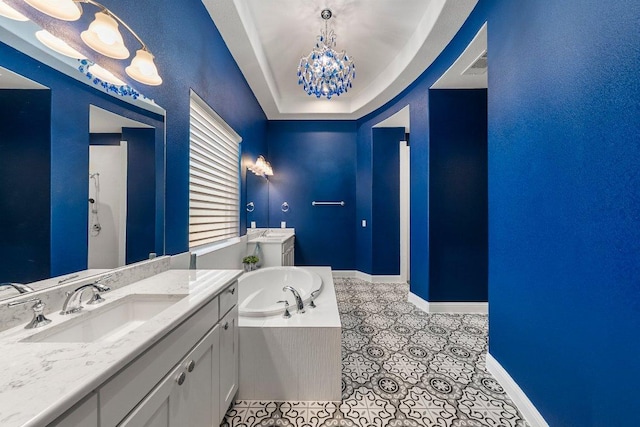 4509 Port Bari Dr, Leander, TX 78641 - full bathroom featuring vanity, a garden tub, and a chandelier